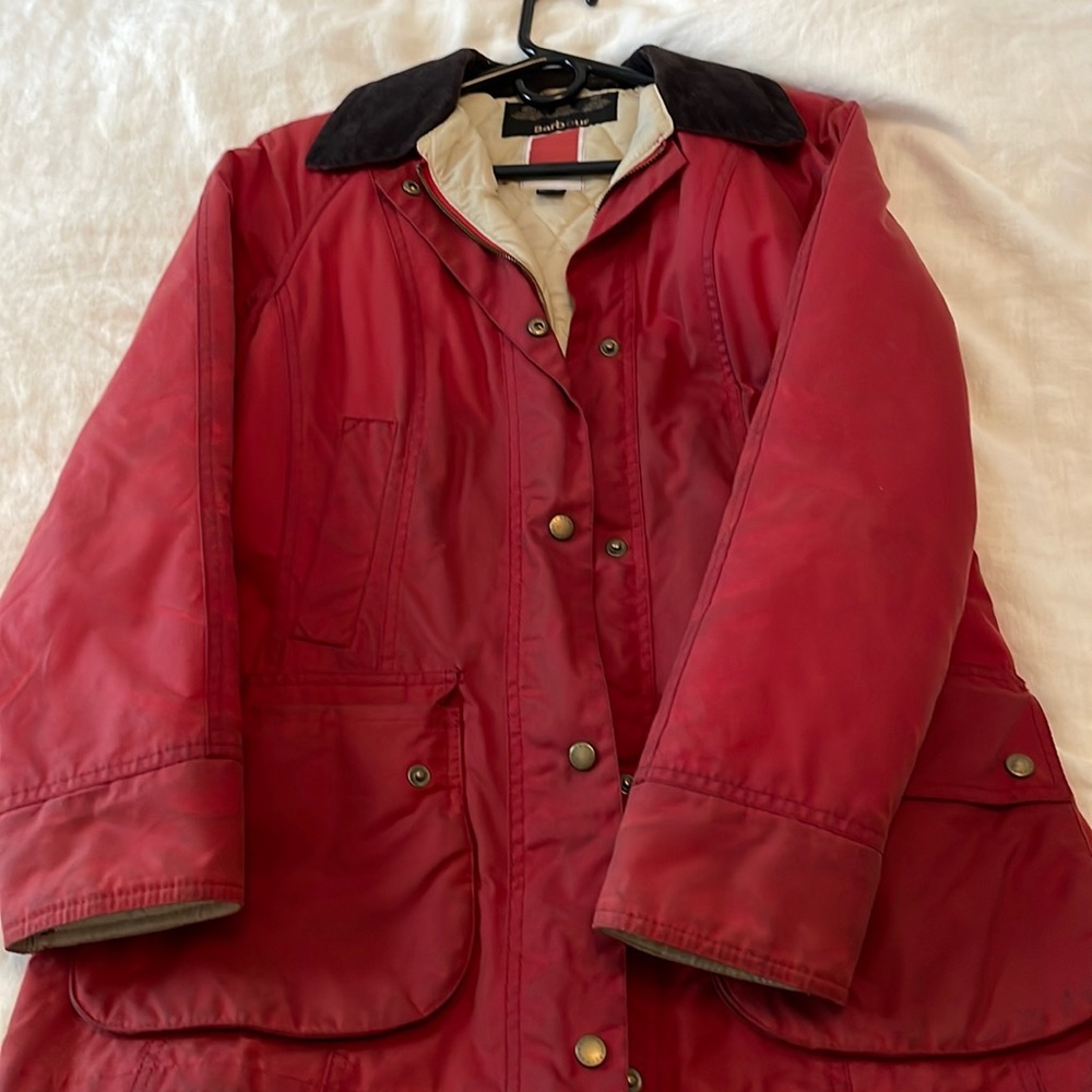 Barbour red waxed cotton jacket with corduroy collar.